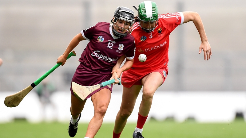 Aoife Donohue (L) and Hannah Looney compete for a ball during the All-Ireland final