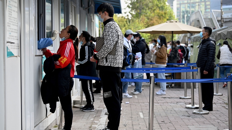 People queue for Covid-19 tests in Beijing