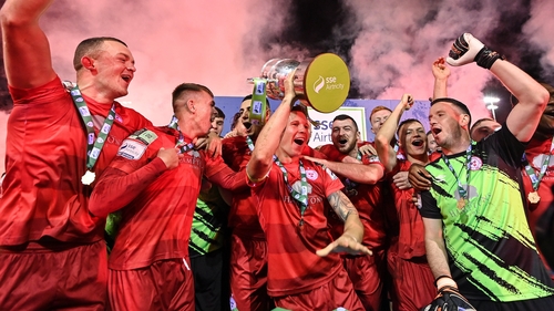 Luke Byrne lifts the SSE Airtricity League First Division trophy