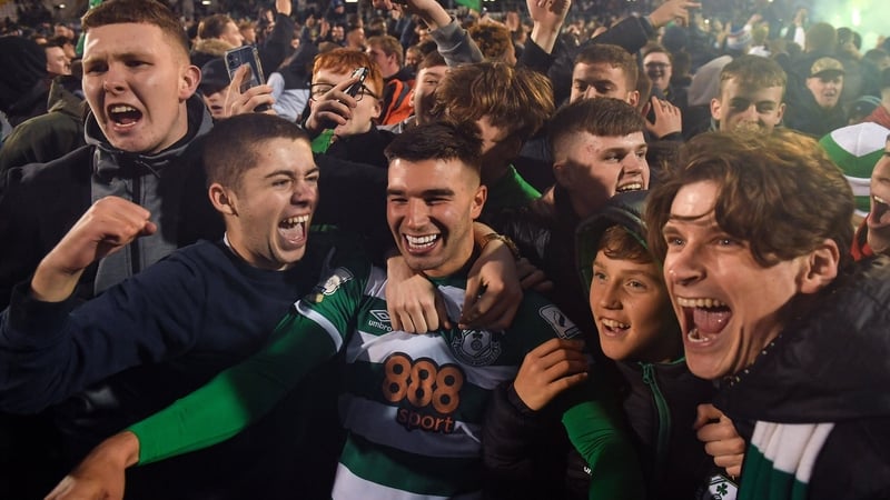 Danny Mandroiu is mobbed by elated fans