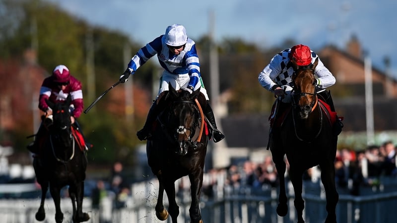 Frodon and Bryony Frost (c) held on to deny Galvin (r)
