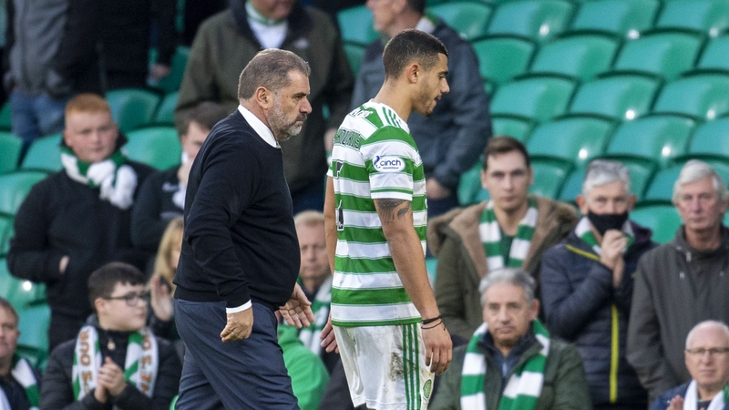 Celtic's Giorgos Giakoumakis (R) and Ange Postecoglou after the game