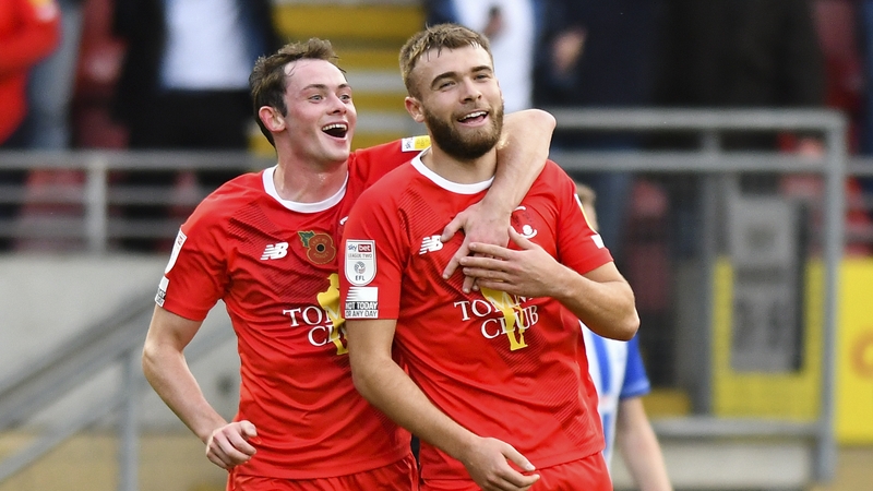 Aaron Drinan (R) celebrates with Theo Archibald