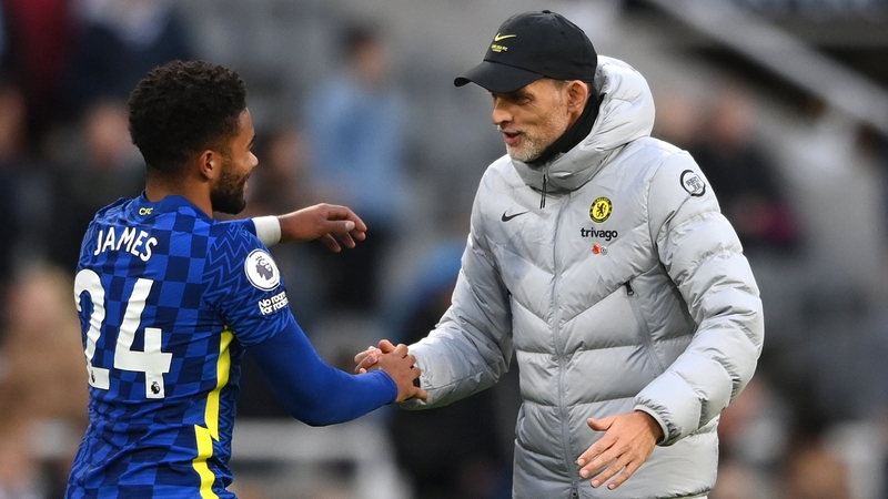 Reece James is congratulated by Chelsea manager Thomas Tuchel