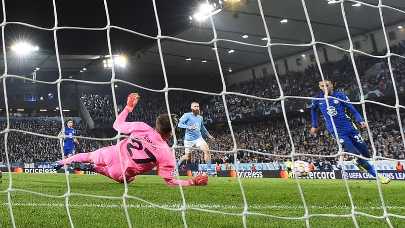 Hakim Ziyech (R) scores the only goal of the game