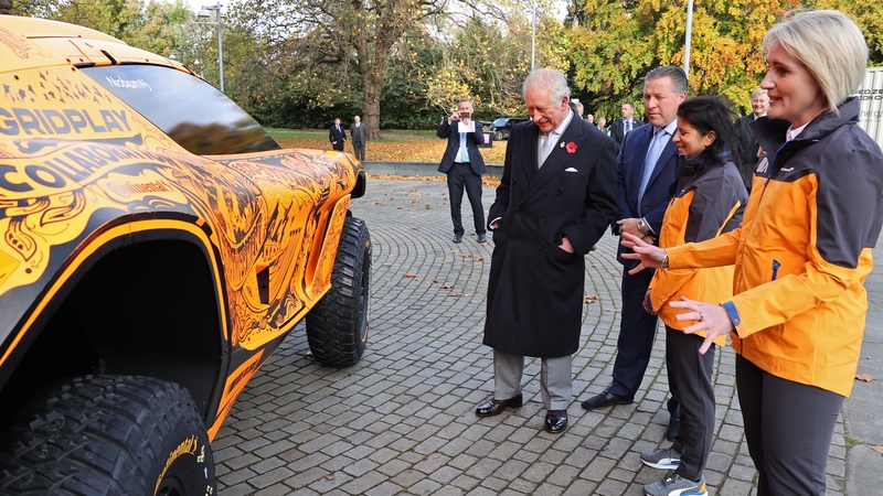 Emma Gilmour (right) with McLaren's Extreme E car