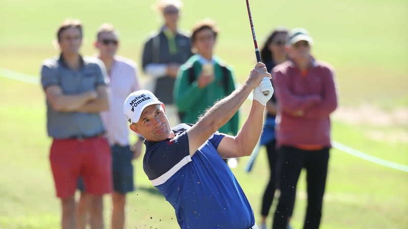 The 2021 Europe Ryder Cup captain playing his second shot on the third hole