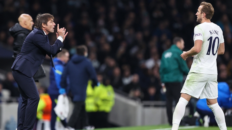 Kane takes advice from his new manager Antonio Conte during Europa Conference League win