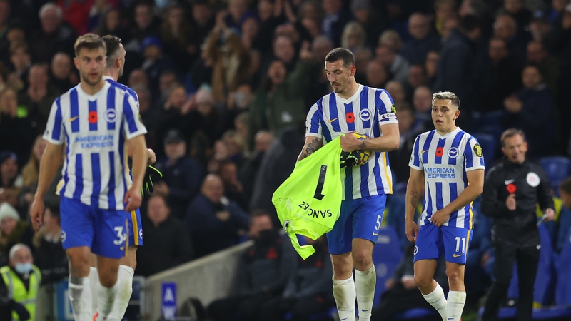 Brighton defender Lewis Dunk was forced to go into goals after Robert Sanchez was sent off