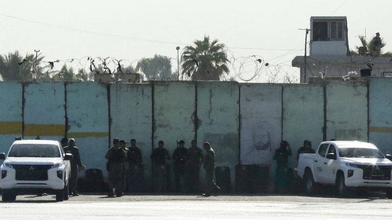 Iraqi security forces at an entrance to the Green Zone following drone attack on the residence of Iraq's prime minister in Baghdad