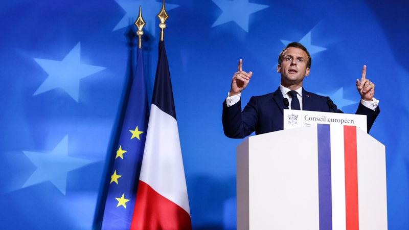 The French flag placed behind Emmanuel Macron at press conferences has a darker navy blue than the previous bright blue