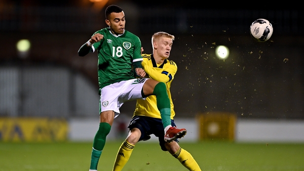 Tyreik Wright of Republic of Ireland in action against Carl Gustavsson of Sweden