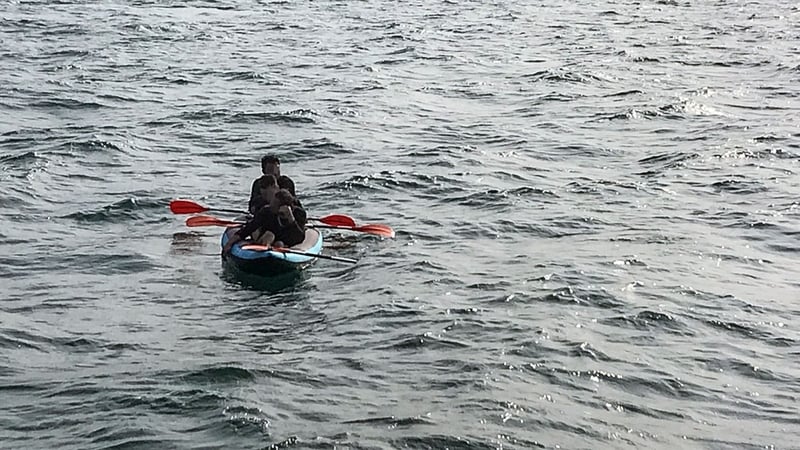 Migrants in a canoe drifting off the coast of Calais (pictured in 2018)