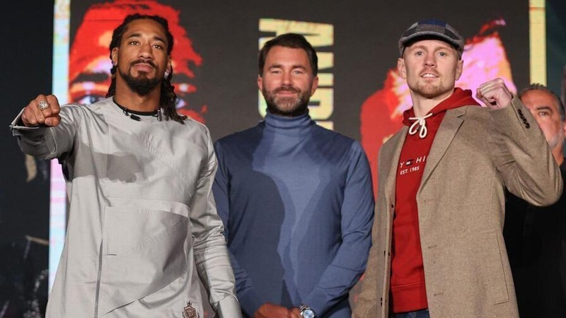 Jason Quigley, right, poses alongside Demetrius Andrade, left and Eddie Hearn. Credit: Ed Mulholland/Matchroom