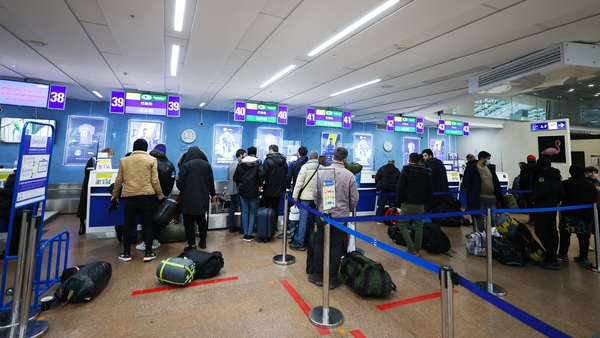 Migrants checking-in for the flight to Iraq at Minsk airport in Belarus