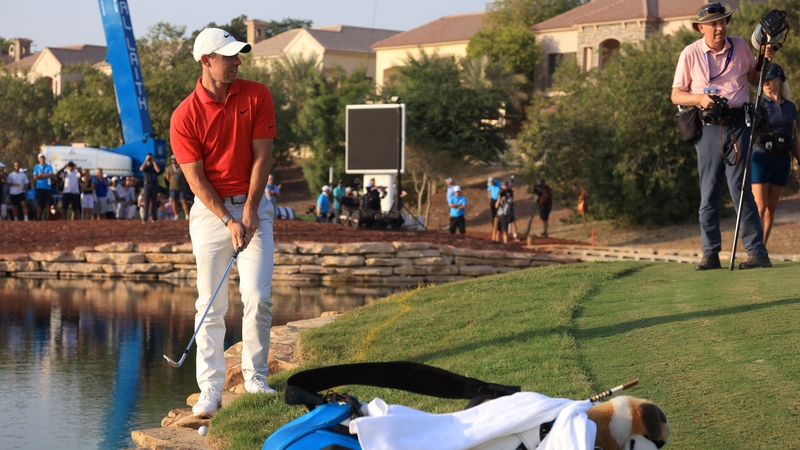 Rory McIlroy eyes up a tricky second shot on the 17th hole at Jumeriah Golf Estates