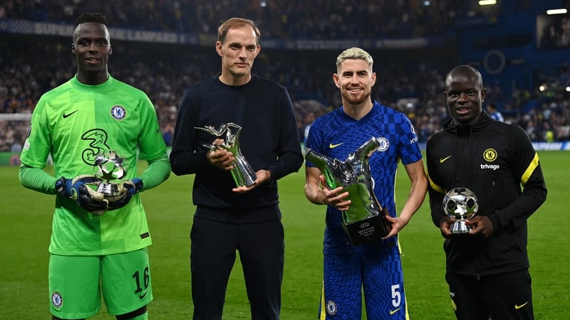 Edouard Mendy, Thomas Tuchel, Jorginho and N'Golo Kante pose with their respective indiviudal Champions League awards