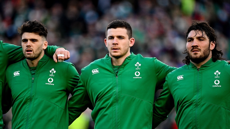 Harry Byrne, Nick Timoney and Tom O'Toole during the national anthem before the win over Argentina