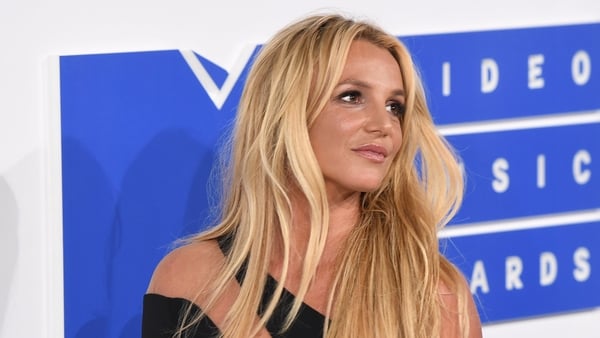 Britney Spears (pictured at the MTV Video Music Awards in New York in August 2016) - Has appeared to announce first professional commitment since a judge terminated the controversial conservatorship that has controlled her life