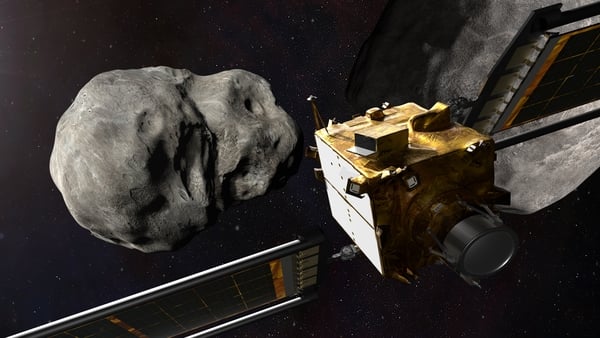 An illustration of NASA's Double Asteroid Redirection Test (DART) spacecraft approaching the Dimorphos and Didymos asteroids