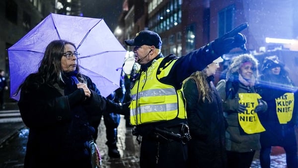 Protesters outside the Ministry of Justice at The Hague in the Netherlands this evening