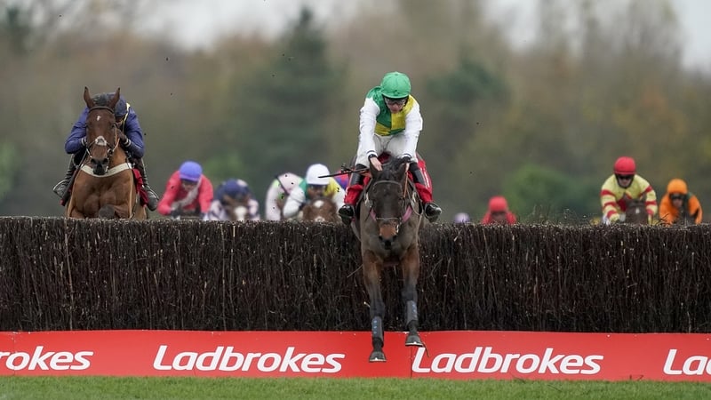 Cloudy Glen clears the last en route to victory in the feature at Newbury