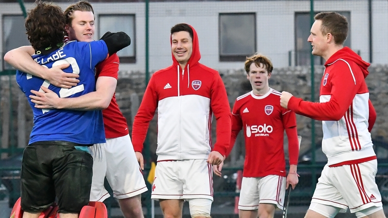 Cookstown celebrate their shootout win. Credit: Adrian Boehm
