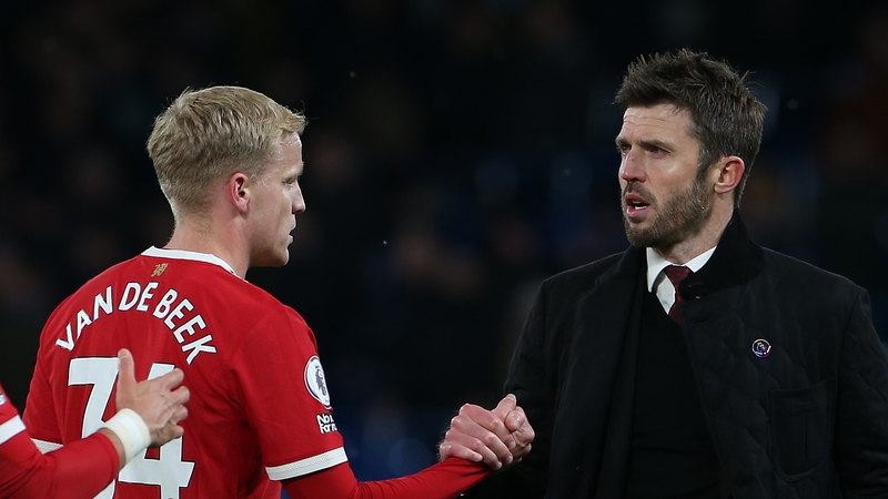 Carrick speaks to Donny van de Beek after the game