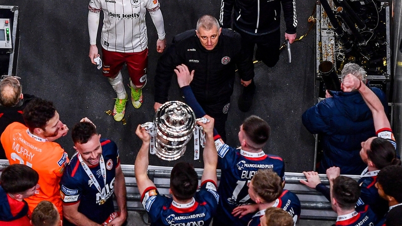 Trevor Croly looks on as his former side celebrate with the FAI Cup
