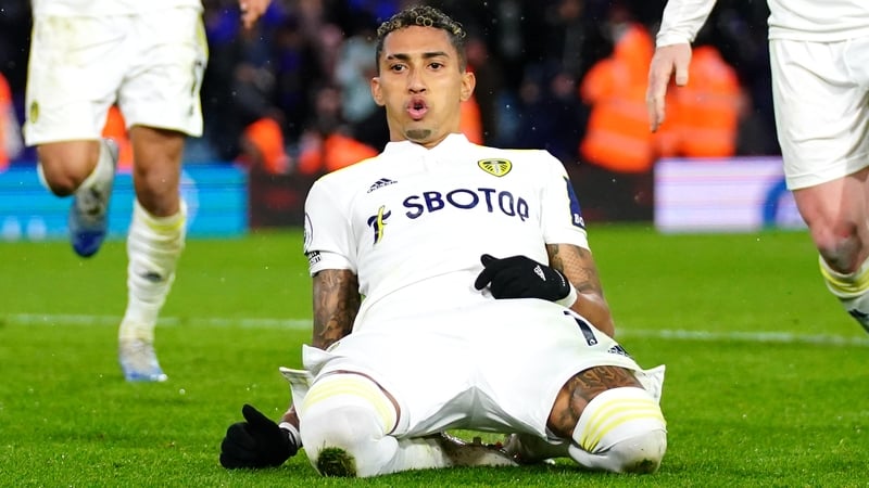 Raphinha celebrates his stoppage time penalty