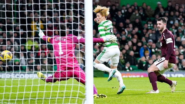 Kyogo Furuhashi finishes past Craig Gordon in the Hearts goal