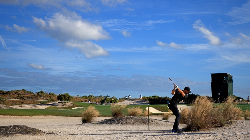 Rory McIlroy on his way to a par at the 16th