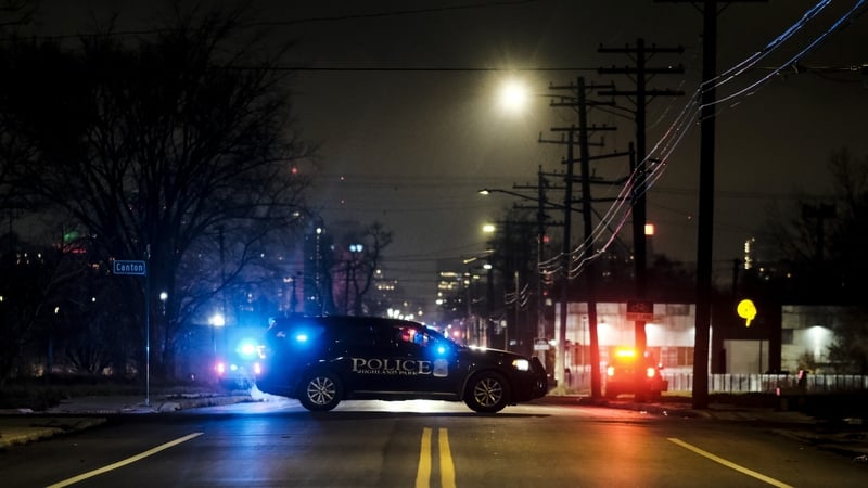 Law enforcement surround the building where James and Jennifer Crumbley were arrested