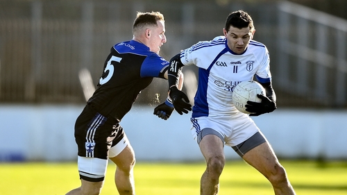 Eamonn Callaghan is tackled by Blessington's Kevin Hanlon