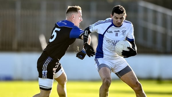 Eamonn Callaghan is tackled by Blessington's Kevin Hanlon