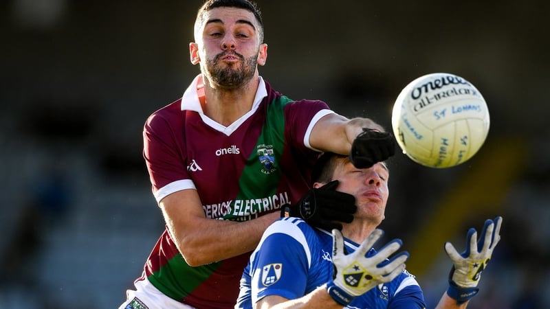 Robert Pigott of Portarlington in action against John Heslin of St Loman's