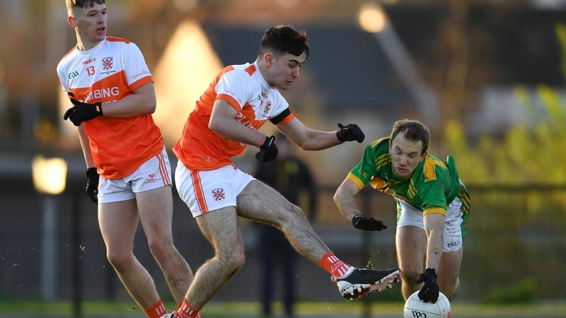 Kickham's Odhran McLarnon blocks a shot at goal by Jack Conlon