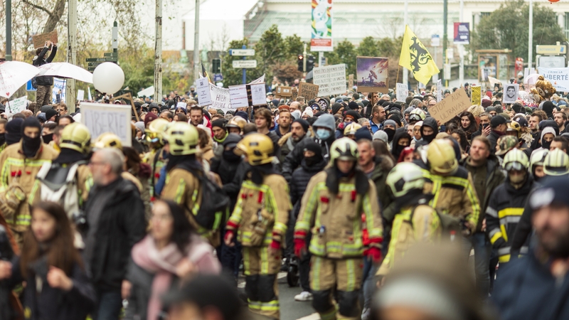 Around 8,000 people marched through Brussels towards the headquarters of the European Union, chanting 'Freedom' and letting off fireworks