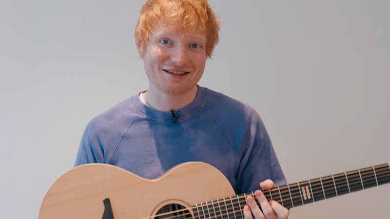 Ed with the prototype Equals guitar. Picture: Gizzwizz charity