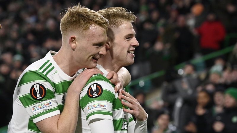 Liam Scales (L) celebrates with Stephen Welsh who scored Celtic's first goal