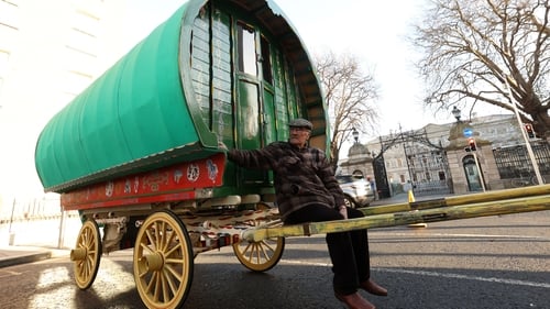 Paddy James Collins from Finglas sitting in his own handmade wagon outside Leinster House (Pics: RollingNews.ie)