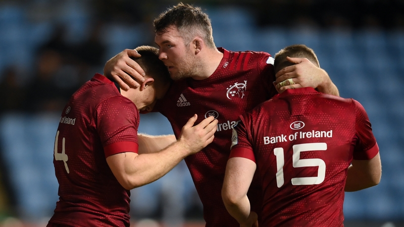 Peter O'Mahony congratulates team-mate Andrew Conway on scoring Munster's third try, along with Patrick Campbell