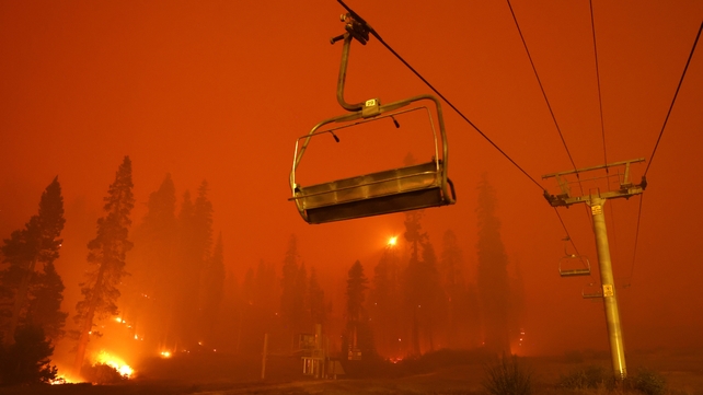 30 August: A chairlift at Sierra-at Tahoe ski resort sits idle as the Caldor Fire moves through Twin Bridges, California
(Photo: Justin Sullivan)