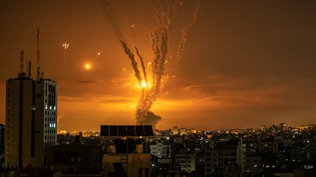 14 May: Rockets launched towards Israel from northern Gaza and the response from the Israeli missile defense system known as the Iron Dome leave streaks through the sky in Gaza City 
(Photo: Fatima Shbair)
