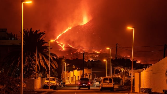 9 October: A car drives through an empty street in the neighborhood of La Laguna as lava flows from the Cumbre Vieja Volcano in La Palma, Spain (Photo: Marcos del Mazo)