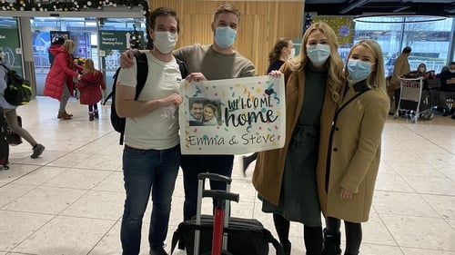Steve Curran (far left) and Emma Kinsella (second from right) are welcomed home