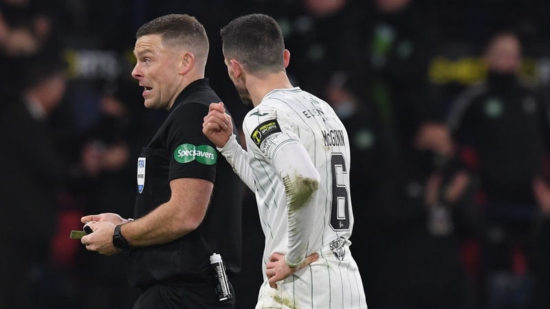 Paul McGinn (R) confronts referee John Beaton after Kyogo Furuhashi's second goal.