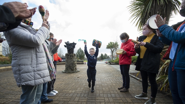 8 March: Matthew Magill is clapped by teachers and staff as he arrives at Hazelwood Integrated Primary School in Newtownabbey, Northern Ireland, as primary schools returned for the first time since Christmas
(Photo: Charles McQuillan)