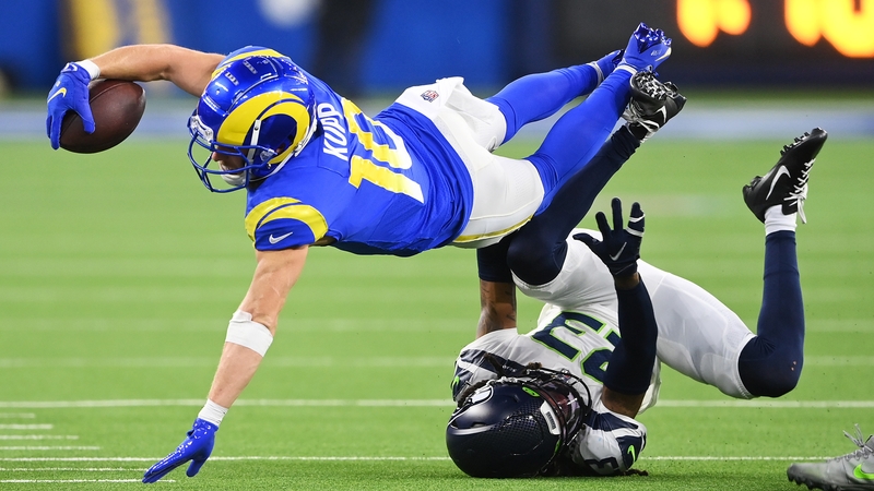 Cooper Kupp leaps over Sidney Jones