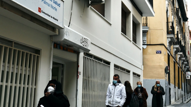 People queue to take a Covid-19 test in Madrid
